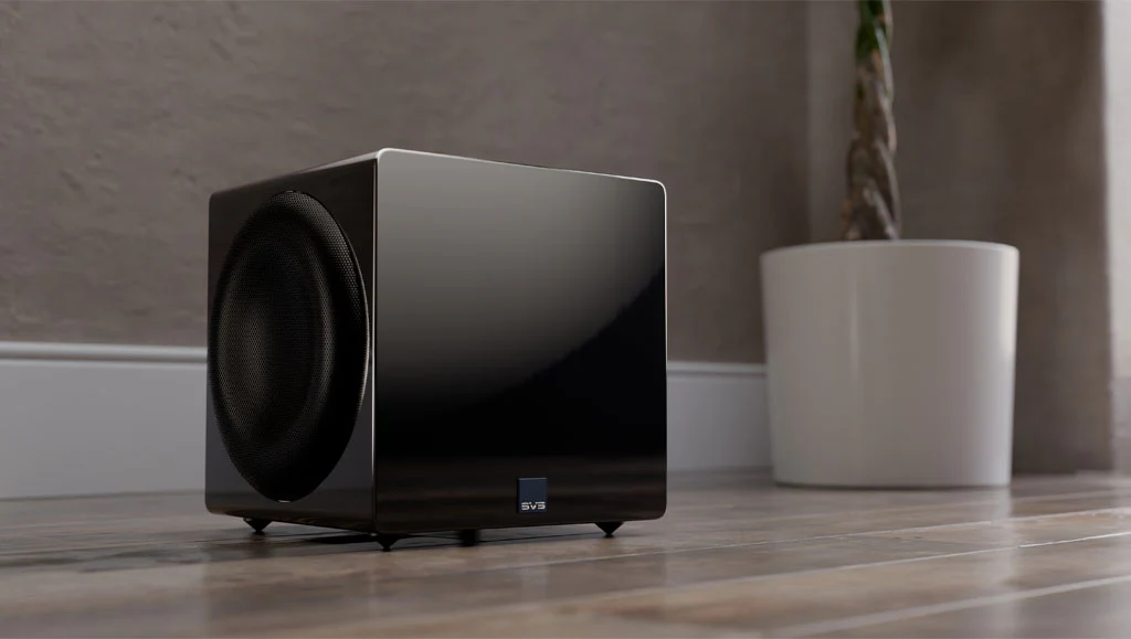 Stylish black SVS subwoofer on a wooden floor, perfect for enhancing your home theater audio experience.