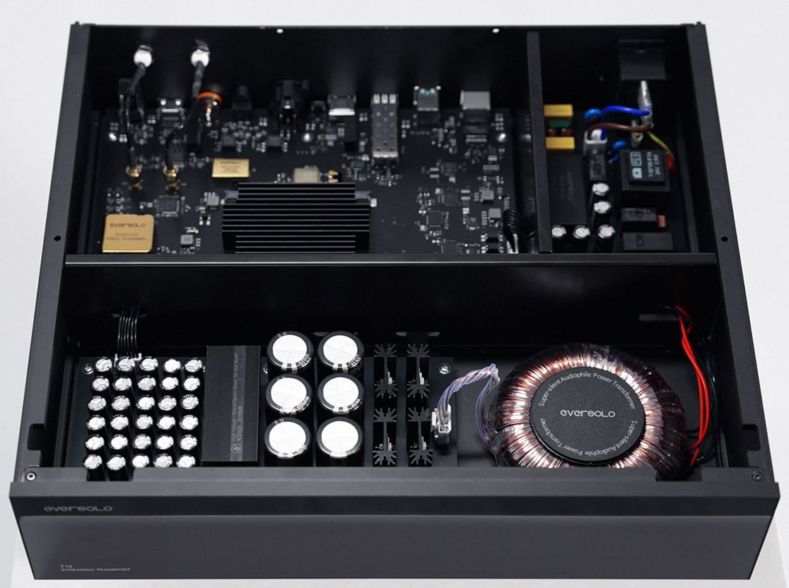 Interior view of a high-end audio streaming transport, showcasing advanced components and a sleek design.
