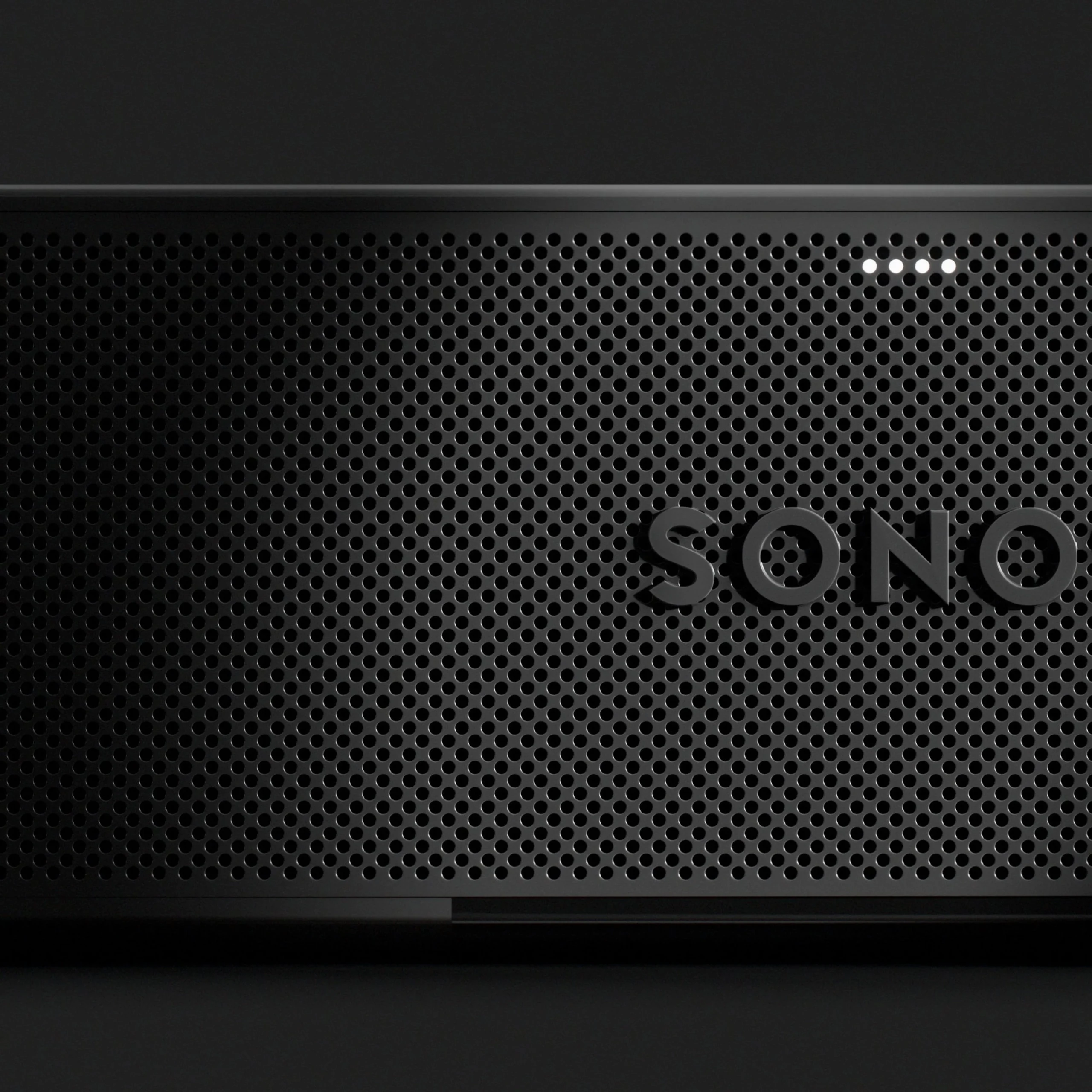 Close-up of a sleek Sonos speaker showcasing its modern design and perforated grille, ideal for quality audio in homes.