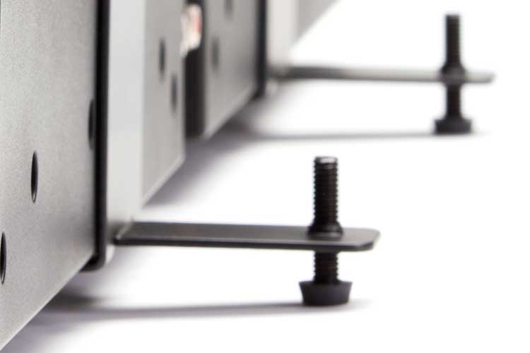 Close-up of a mounting bracket with screws, showcasing detailed metalwork for robust installation in AV setups.